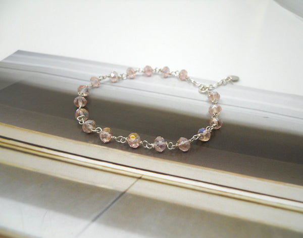 Sølv armbånd med lyserøde krystaller